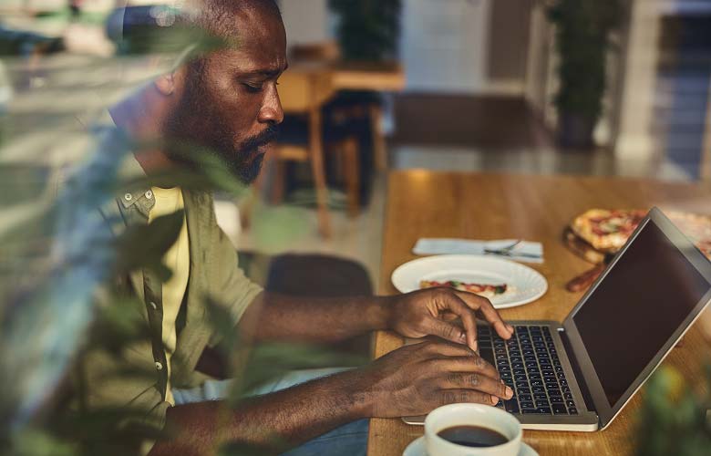 Image of someone paying for an item online with USDC using their laptop