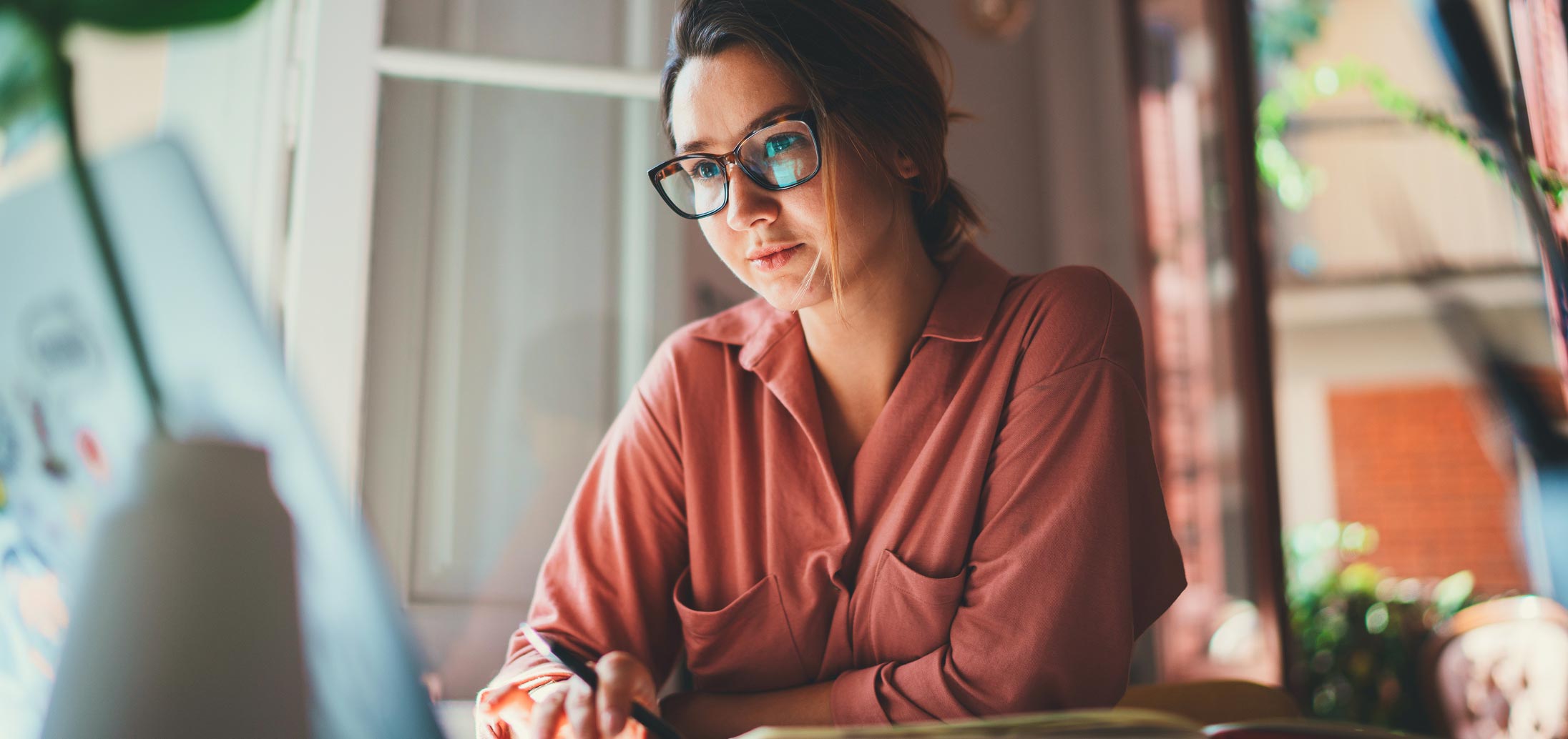 Image of a person using a laptop