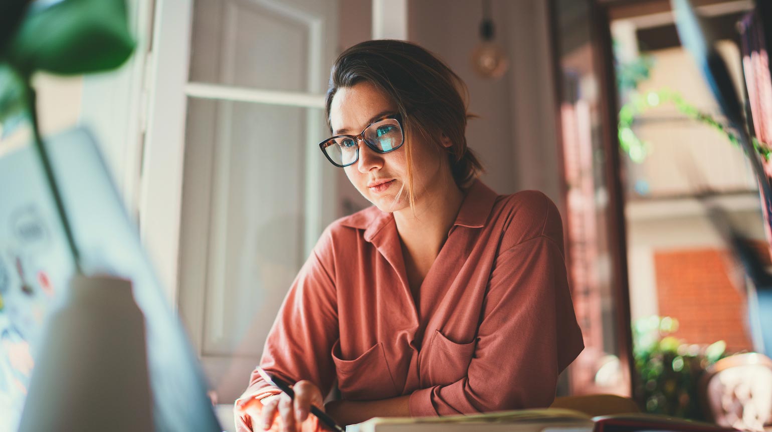 Image of a person using a laptop