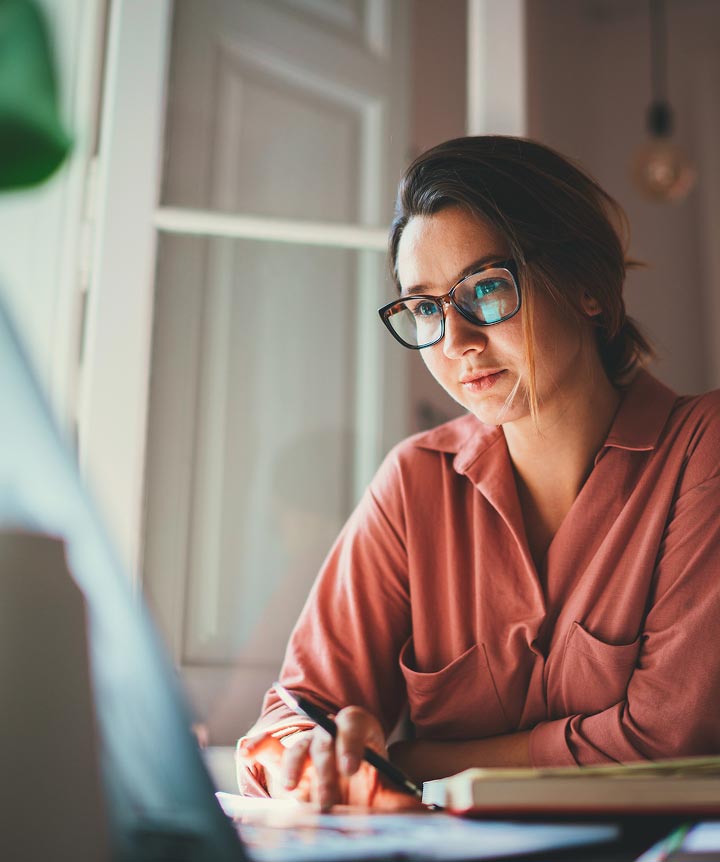 Image of a person using a laptop